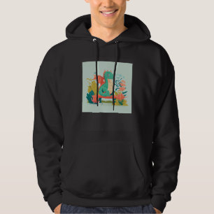 Cute Green Dragon sitting on bench in a garden for Hoodie