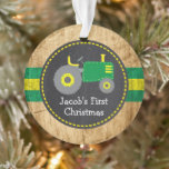 Cute Green Tractor Baby's First Christmas Rustic Ornament<br><div class="desc">This ornament design is in our cute green tractor theme in green and yellow with a wood background. Click the customise button for more flexibility in modifying the text! Variations of this design, additional colours, as well as coordinating products are available in our shop, zazzle.com/store/doodlelulu. Contact us if you need...</div>