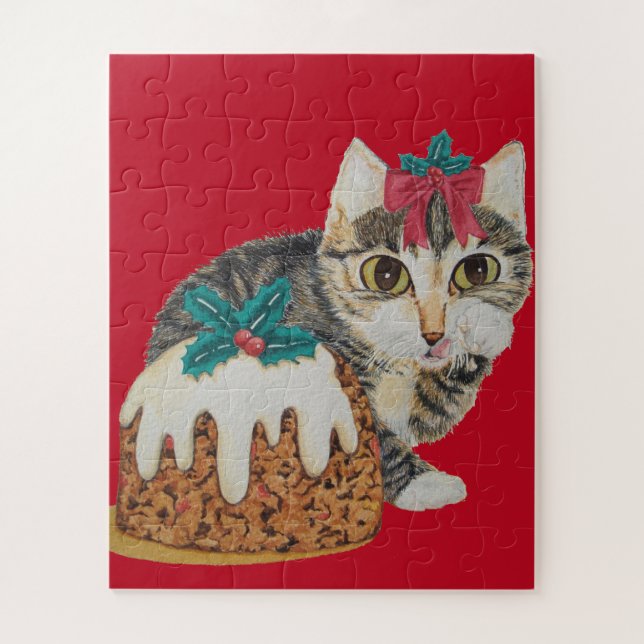 cute grey tabby kitten licking paw for christmas jigsaw puzzle (Vertical)