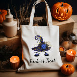 Cute Halloween Blue Witch Hat Trick or Treat Tote Bag<br><div class="desc">This Halloween tote bag features a cute witch's face with blue faux glitter eyelids beneath a blue hat decorated with gold moons and stars,  and adorned with a blue flower and a spider's web. The text below reads "Trick or Treat" in black handwriting-style brush font.</div>