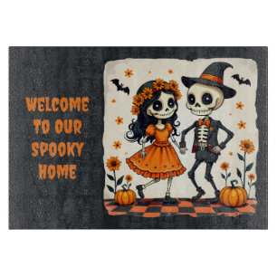Cute Halloween Skeleton Couple in Orange Cutting Board