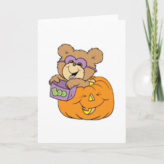 cute halloween teddy bear in pumpkin boo card