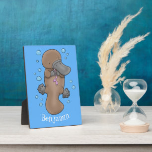 Cute happy baby platypus cartoon illustration plaque
