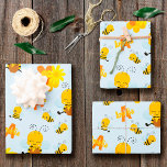 Cute Happy Bumble Bee with Flowers Little Kid Wrapping Paper Sheet<br><div class="desc">Add a cute touch to your little one's present with this adorable custom bumble bee wrapping paper. Wrapping paper features happy bees, one with honey, and the others buzzing around. There are also yellow and orange flowers and a soft blue background. There's also space for your young kid's first name...</div>