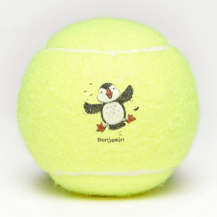 Cute happy flying puffin blue cartoon illustration tennis balls