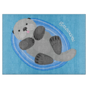 Cute happy sea otter cartoon illustration cutting board