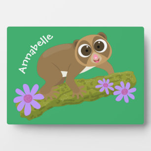Cute happy slow loris on branch cartoon plaque