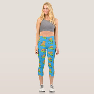 Cute, happy snail on a leaf cartoon illustration capri leggings