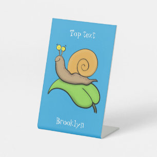 Cute, happy snail on a leaf cartoon illustration pedestal sign