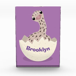 Cute hatching baby ostrich cartoon illustration photo block