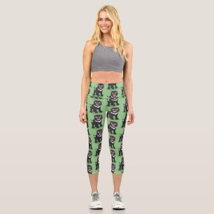 Cute hungry Tasmanian devil cartoon illustration Capri Leggings