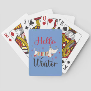 Cute ice skating dog playing cards