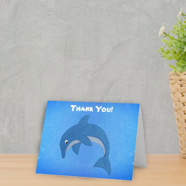 Cute Jumping Glitter Like Cartoon Blue Dolphin  Thank You Card (Glitter like jumping cute blue and white dolphin on  vibrant background of blues on Thank you card.)