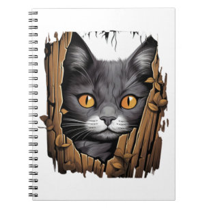 Cute kitten looks from torn fabric - Cats T-Shirt Notebook