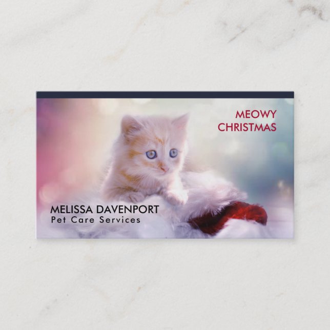 Cute Kitten Resting On a Santa Hat Meowy Christmas Business Card (Front)