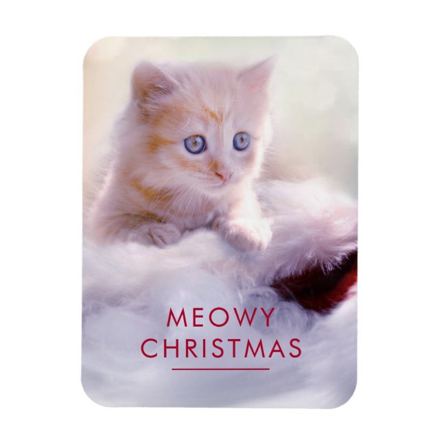 Cute Kitten Resting On a Santa Hat Meowy Christmas Magnet (Vertical)