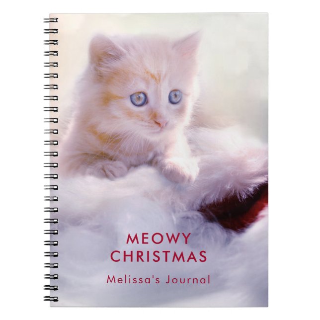 Cute Kitten Resting On a Santa Hat Meowy Christmas Notebook (Front)