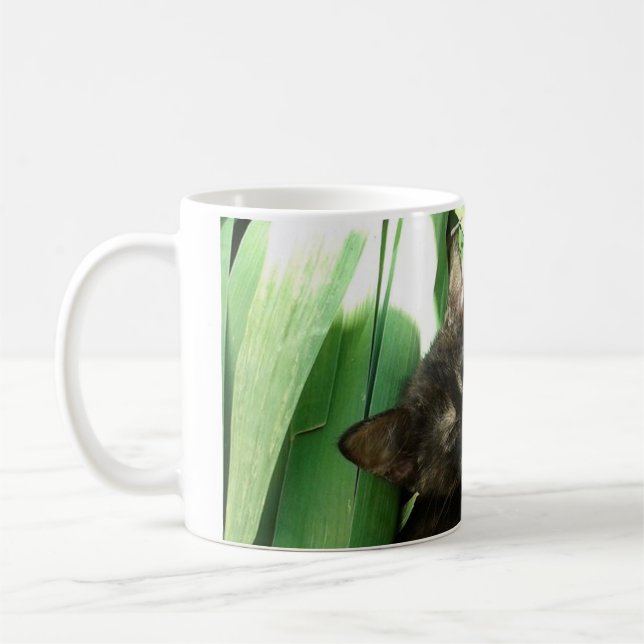 Cute kittens cuddling coffee mug (Left)