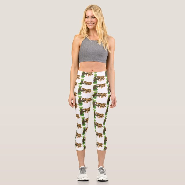 Cute leopard sleeping in tree cartoon illustration capri leggings (Front)
