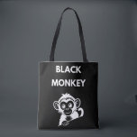 Cute Little Black Monkey Tote Bag<br><div class="desc">Meet your new favorite jungle friend! This adorable peeking monkey design features a clean,  white illustration that pops perfectly on dark fabrics. A fun and playful choice for kids,  wildlife enthusiasts,  or anyone who loves a bit of monkey business.</div>
