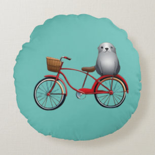 Cute little cartoon seal on a bicycle round cushion