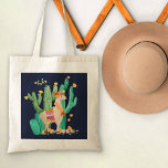 Cute Llama in Cactus Garden with Yellow Flowers Tote Bag<br><div class="desc">Cute llama scene in watercolor, which you can personalise with your name or custom text. This pretty blonde llama has a flower and feathers in her hair, a matching garland and a traditional Peruvian saddle mat. She is standing in a flowering cactus garden with pretty yellow blooms. This is a...</div>