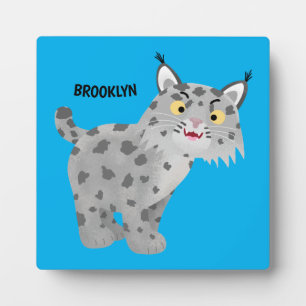 Cute mean bobcat lynx cartoon plaque