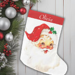 Cute Mid Century Vintage Santa Personalised Large Christmas Stocking<br><div class="desc">This charming Christmas stocking is a nostalgic nod to mid-century holiday cheer, featuring a delightful vintage Santa image that exudes warmth and joy. The front showcases Santa in his classic red suit with rosy cheeks and a twinkle in his eye, capturing the timeless spirit of Christmas past. At the top,...</div>