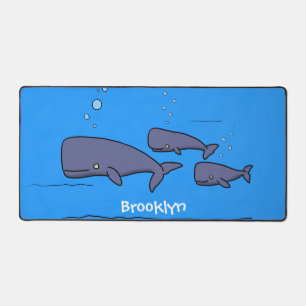 Cute migrating cartoon whales illustration desk mat