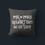Cute Mr and Mrs chalkboard wedding throw pillows<br><div class="desc">Custom Mr and Mrs black chalkboard wedding throw pillow. Personalised black chalk board pillow cushions for sofa or bed.  Fun design with white heart and name of newly wed couple. Cute home decor personalised for bride and groom / husband and wife. Romantic wedding presents for newlyweds.</div>