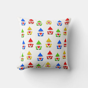 Cute multicolored gnomes on white cushion