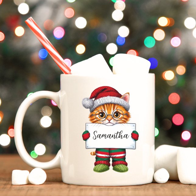 Cute Orange Cat Personalised Christmas Mug (Orange kitty wearing a Santa hat and Christmas pajama, custom Christmas mug. Cat lover gift idea)