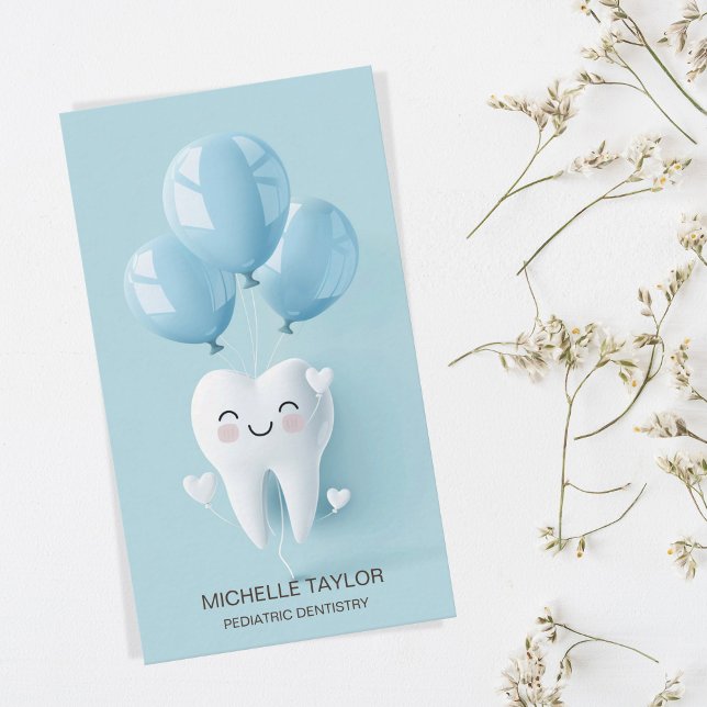 Cute Paediatrics Family Dentist Tooth Smile Business Card (a tooth being lifted into the air by balloons)