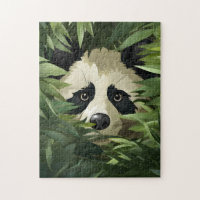 Cute panda bear behind bamboo leaves