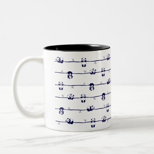 Cute Panda hanging on branches  Two-Tone Coffee Mug (Left)