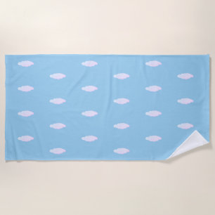 Cute pastel clouds on light sky blue beach towel