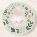 Cute Pastel Spring Bunny Floral Wreath Nursery Art Coaster<br><div class="desc">Bring a touch of sweet, whimsical nature to your space with this adorable spring bunny design. The artwork features a soft, pastel pink sleeping rabbit surrounded by a beautiful botanical wreath of blooming spring flowers and leaves. This charming watercolor-style illustration is perfect for customizing Easter gifts, baby shower invitations, nursery...</div>