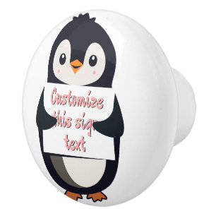 Cute penguin holding a sign for personalized text ceramic knob