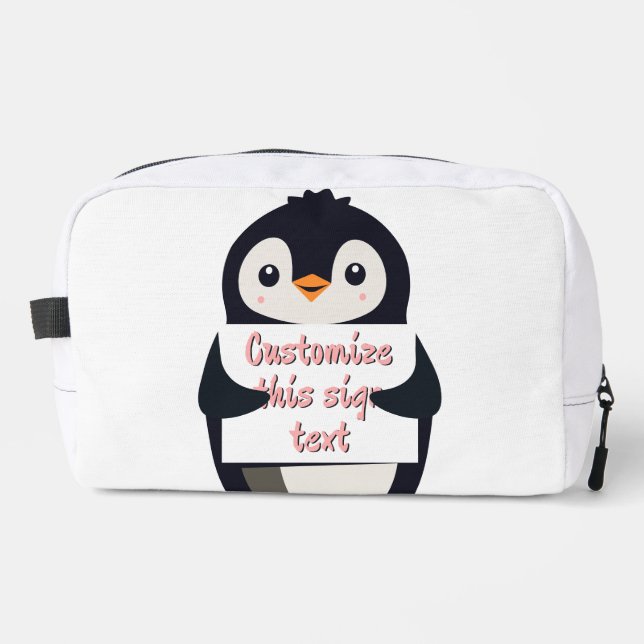 Cute penguin holding a sign for personalized text dopp kit (Front)