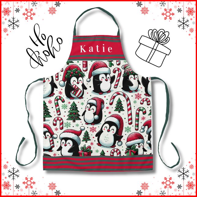 Cute Penguins in Christmas Santa Hats Apron (Cute Penguins in Christmas Santa Hats with candy canes, Christmas Trees and Gifts. Get Yours Now!)