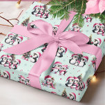 Cute Penguins Pattern Mint and Pink Christmas Wrapping Paper<br><div class="desc">This joyful mint green and pink Christmas wrapping paper features a unique pattern of penguins in pink apparel having fun while celebrating the winter holidays. Cute penguins decorate Christmas trees,  meet family and friends,  and go ice skating,  so this design is perfect for stylish festive gift wraps.</div>