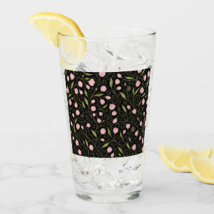 Cute, pink flower on black with repeating pattern glass