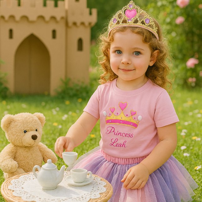 Cute Pink Princess Baby Girl T-Shirt (A joyful toddler girl at a tea party with a teddy bear. This t-shirt is ideal for a little princess)