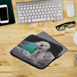 Cute Playful Sea Otters Laptop Sleeve<br><div class="desc">Protect your computer laptop with this zippered sleeve that features the photo image of a pair of cute Sea Otters playing with a ball toy. Back of sleeve is black. Select your laptop sleeve size.</div>