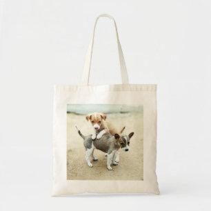 Cute Puppies Playing on Beach Tote Bag