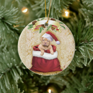 Cute Puppy in a bag with Christmas toys Ceramic Tree Decoration