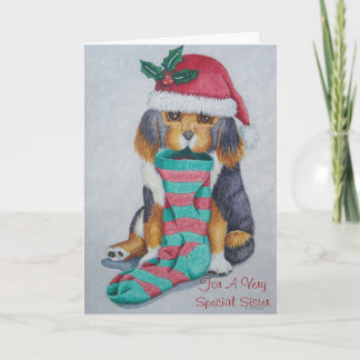 cute puppy with christmas stocking and santa hat holiday card