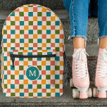 Cute Retro Chequerboard Monogram Multicolored Printed Backpack<br><div class="desc">This fun, stylish custom backpack features a chequerboard pattern in retro shades of golden yellow, teal, olive green, melon orange, and cream. A monogram initial text template is included - use it to personalise your backpack or remove it and the circle, if you'd prefer no monogram. This cute, colourful backpack...</div>