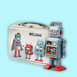 Cute Retro Robots Personalised Sci-Fi Metal Lunch Box<br><div class="desc">Add a sci-fi touch to your lunch with this personalised lunchbox. It features illustrations of three cute retro style robots in shades of blue and red and has a spot on the front to add a name in navy blue lettering. The graphics appear on both the front and the back...</div>