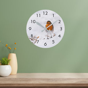 Cute Robin bird in snow Round Clock